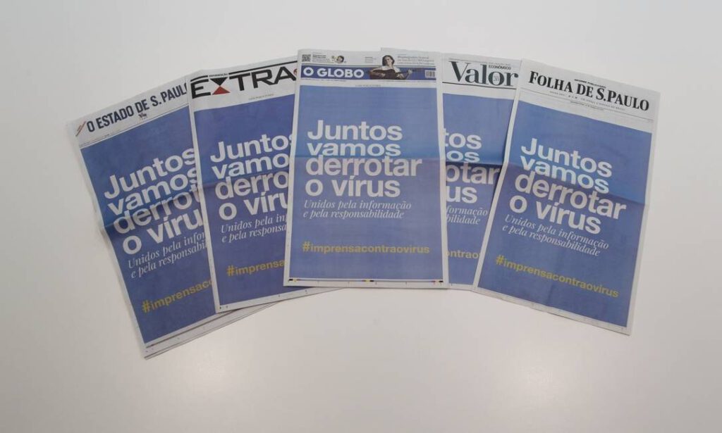 capas de jornal em cima de uma mesa - propósito de marca e a crise do coronavirus